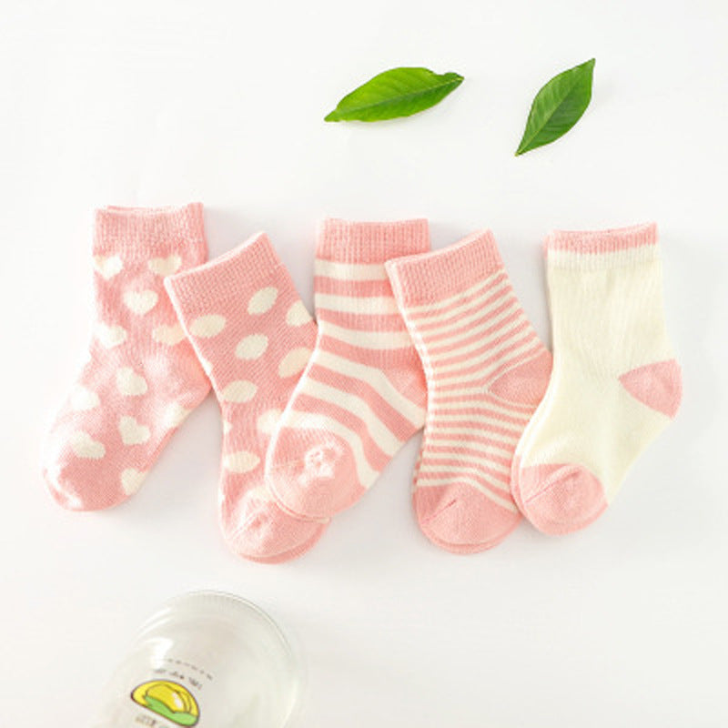 Set of pink baby socks with different patterns